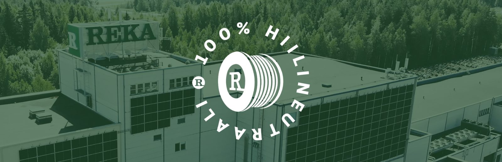 Riihimäen tehdas, päällä valkoinen hiilineutraalilogo