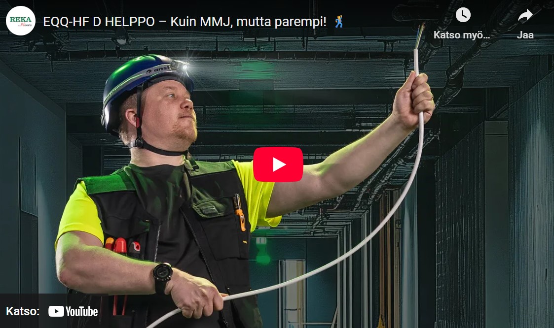 Asentaja pitää EQQ-HF D Helppo -kaapelia kädessään tanssiasennossa